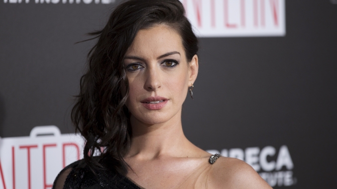 Cast member Anne Hathaway arrives for the premiere of “The Intern” in New York