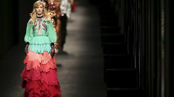Models present creations from the Gucci Autumn/Winter 2016 woman collection during Milan Fashion Week