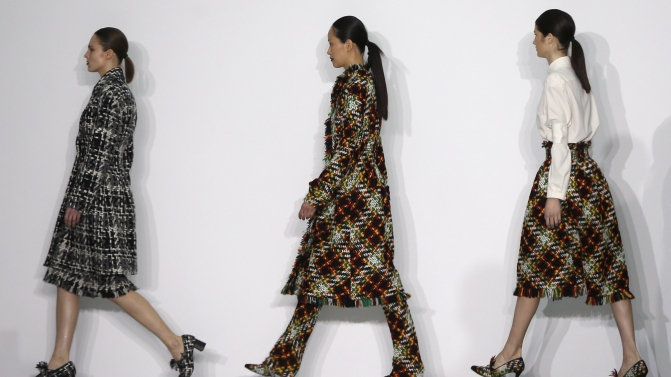 Models present creations from the J. JS Lee catwalk show at London Fashion Week Autumn/Winter 16 in London, Britain