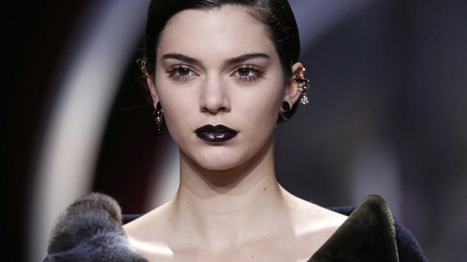 Model Kendall Jenner presents a creation by Swiss designers Serge Ruffieux and Lucie Meier as part of their Fall/Winter 2016/2017 women’s ready-to-wear collection show for Dior in Paris