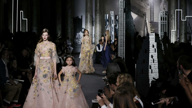 Models present creations by Lebanese designer Elie Saab as part of his Haute Couture Fall/Winter 2016/2017 collection in Paris