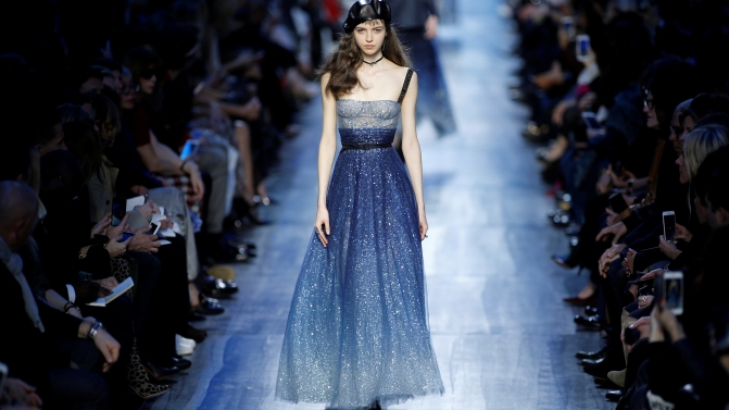 A model presents a creation from the Fall/Winter 2017-2018 women’s ready-to-wear collection by Italian designer Maria Grazia Chiuri for fashion house Dior during Fashion Week in Paris