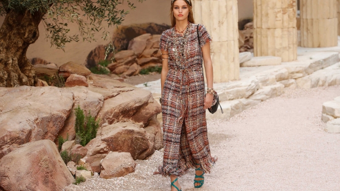A model presents a creation by German designer Karl Lagerfeld as part of his 2017/2018 Cruise collection show for French fashion house Chanel in Paris