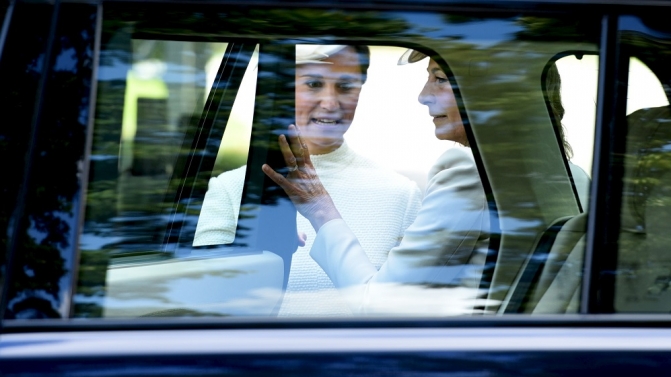 Carole and Pippa Middleton arrive at the Church of St Mary Magdalene on the Sandringham Estate for the christening of Princess Charlotte
