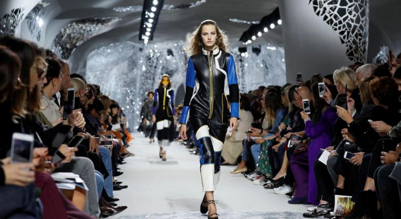 A model presents a creation by Italian designer Maria Grazia Chiuri as part of her Spring/Summer 2018 women’s ready-to-wear collection show for fashion house Dior during Paris Fashion Week