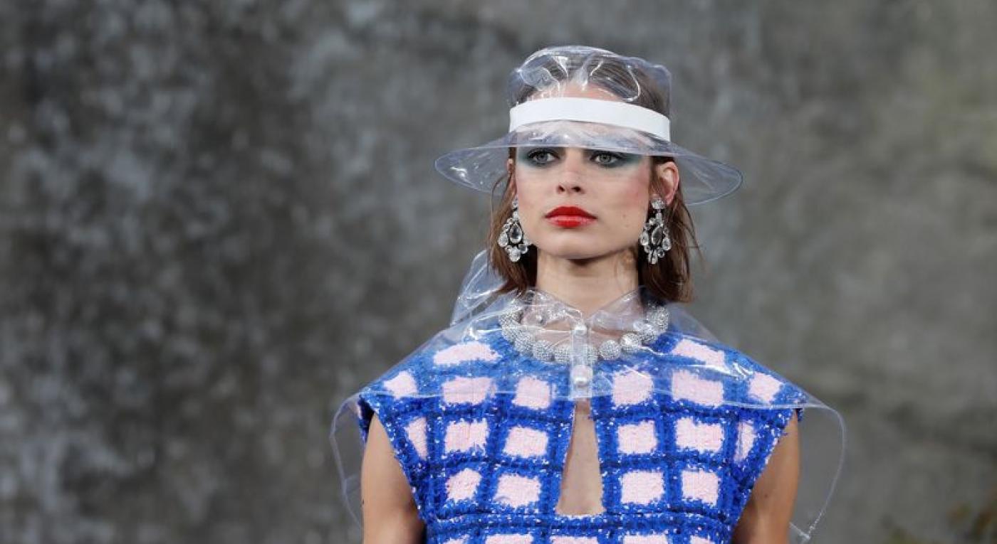 A model presents a creation by German designer Karl Lagerfeld as part of his Spring/Summer 2018 women’s ready-to-wear collection show for fashion house Chanel at the Grand Palais during Paris Fashion Week