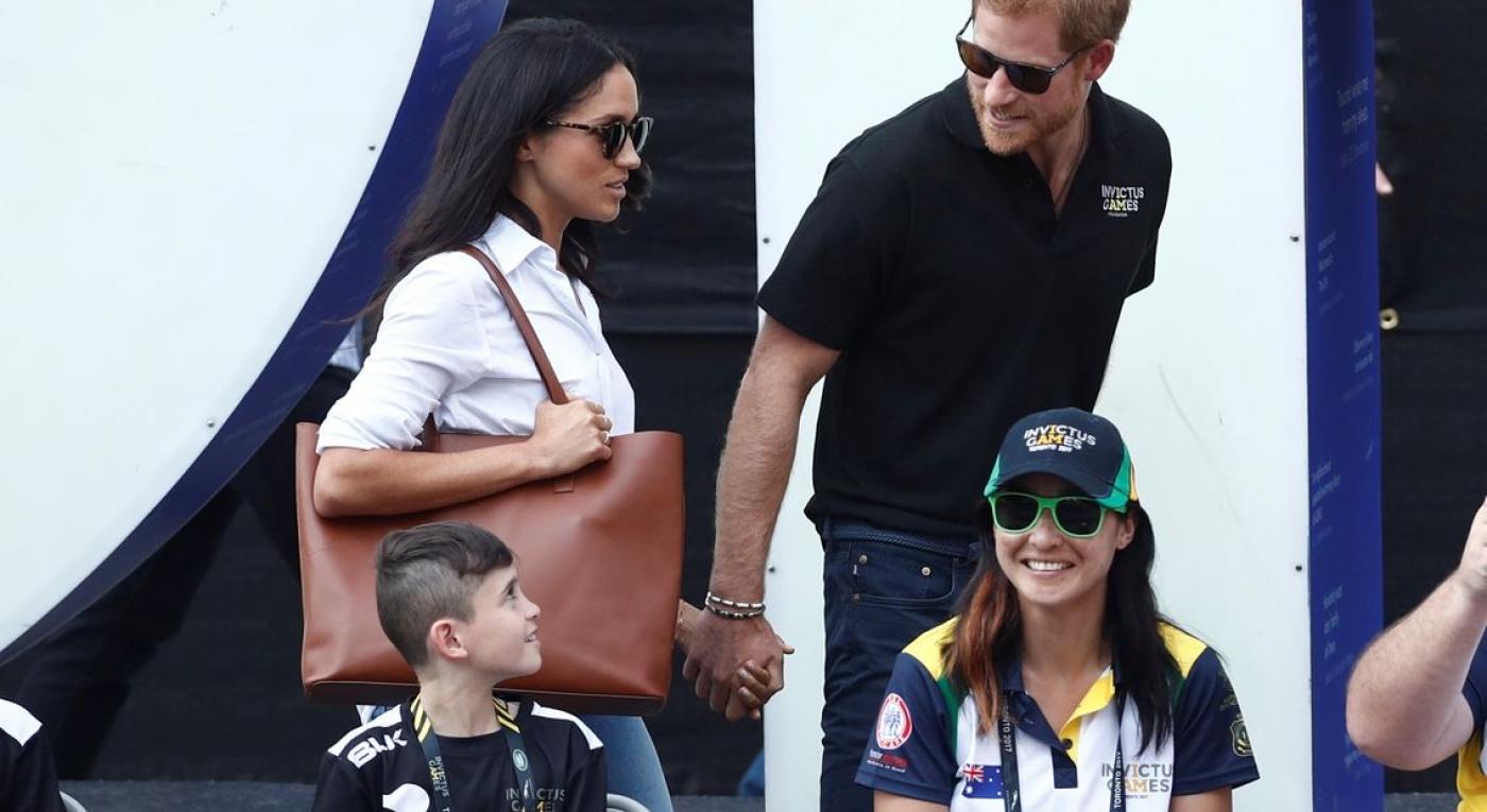Britain’s Prince Harry arrives with girlfriend actress Markle at the wheelchair tennis event during the Invictus Games in Toronto