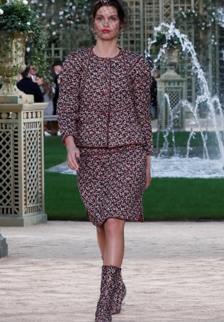 A model presents a creation by German designer Karl Lagerfeld as part of his Haute Couture Spring-Summer 2018 fashion collection for fashion house Chanel in Paris