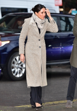 Meghan Markle arrives to visit radio station Reprezent FM, with her fiancee Britain’s Prince Harry, in Brixton, London