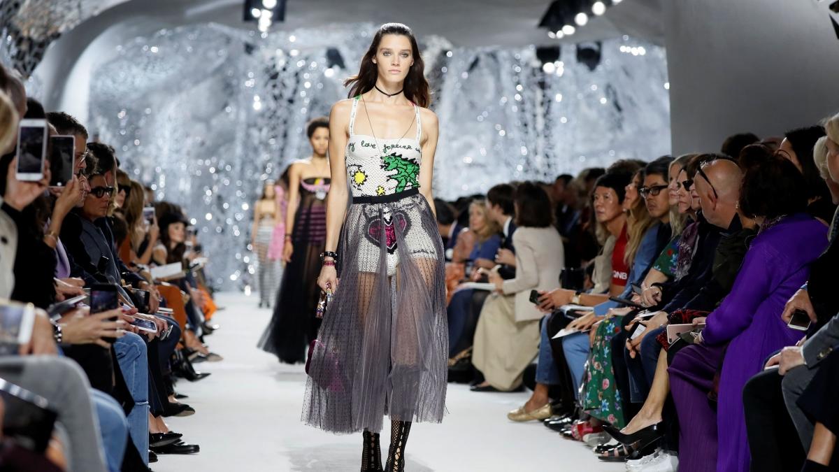 A model presents a creation by Italian designer Maria Grazia Chiuri as part of her Spring/Summer 2018 women’s ready-to-wear collection show for fashion house Dior during Paris Fashion Week