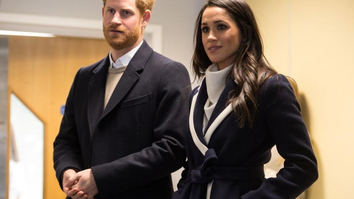 Britain’s Prince Harry and his fiancee Meghan Markle watch Coach Core apprentices taking part in a training masterclass exercise at Nechells Wellbeing Centre in Birmingham