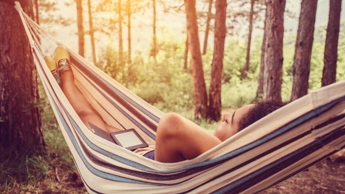 Woman relaxing in hammock