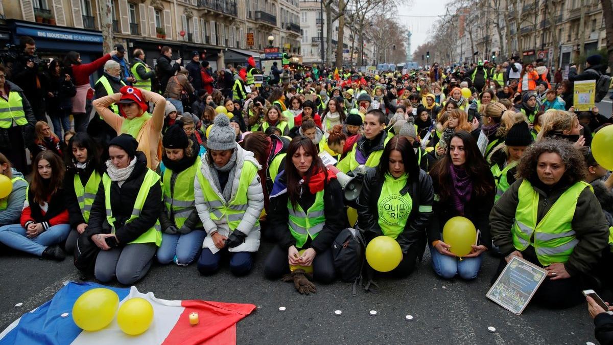 Protesters wearing yellow vests take part in a demonstration by the “Women’s yellow vests” movement in Paris