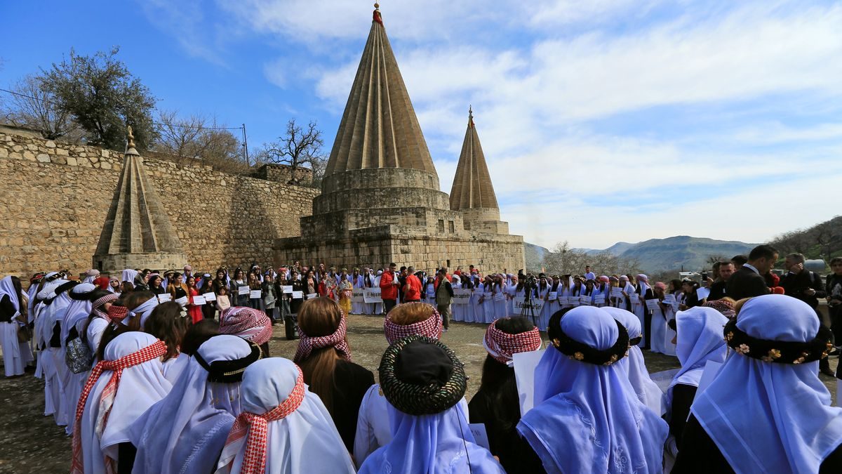 Yazidi's women attend a ceremony at Lilash Temple to commemorate the death of women who were killed by Islamic State militants, during the International Women Day, in Shikhan