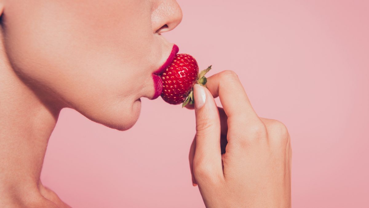 Close-up cropped half face profile side view portrait of lovely
